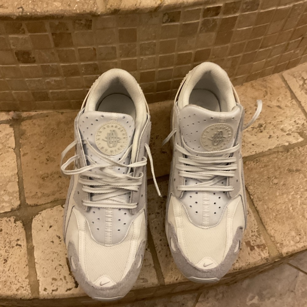 Nike Huarache white, cream, and light gray.